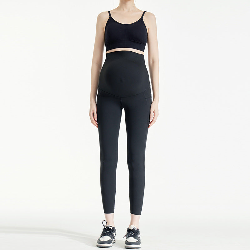 Over-bump maternity leggings in black, front view