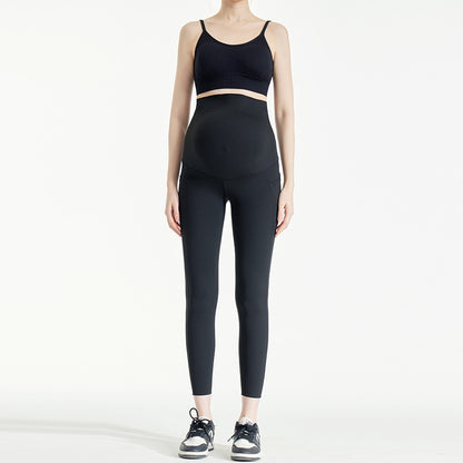 Over-bump maternity leggings in black, front view